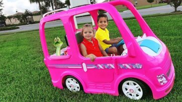 Happy Kids Ride a Pink Toy Car Adventure in the Garden with Friends