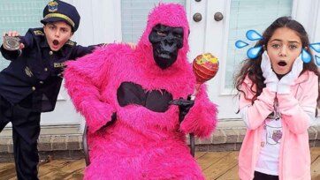Police Kid and Pink Gorilla Discover Giant Lollipops Surprise Story
